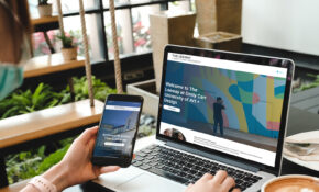 An open laptop with the front page of the Leeway website displayed.